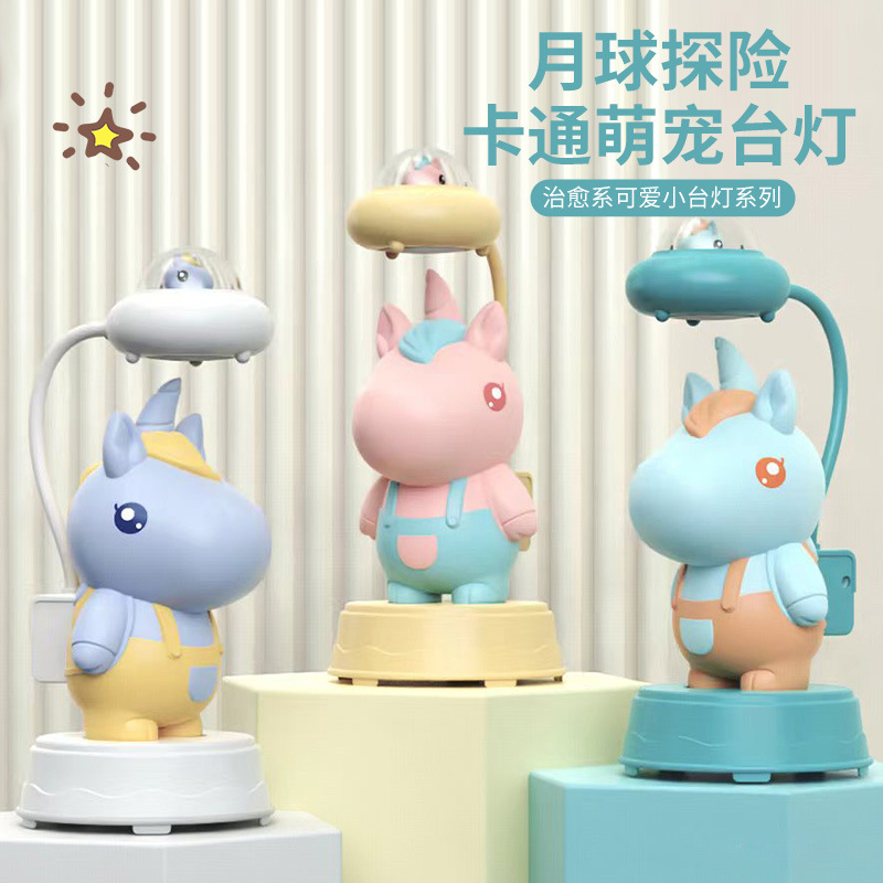 Dibujos animados astronauta Rana dinosaurio unicornio sacapuntas lámpara de mesa USB recargable habitación de los niños LED protección de los ojos lámpara de mesa