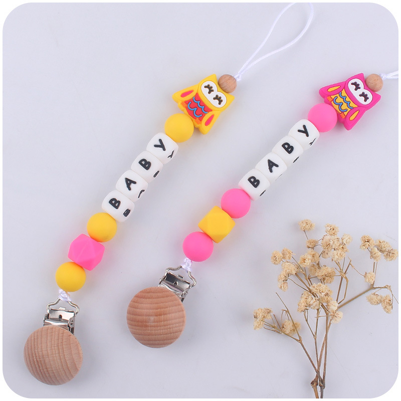 Nuevo bebé de dibujos animados animal mariposa Pavo Real búho mordedor calmante bebé molar pezón anti-gota cadena