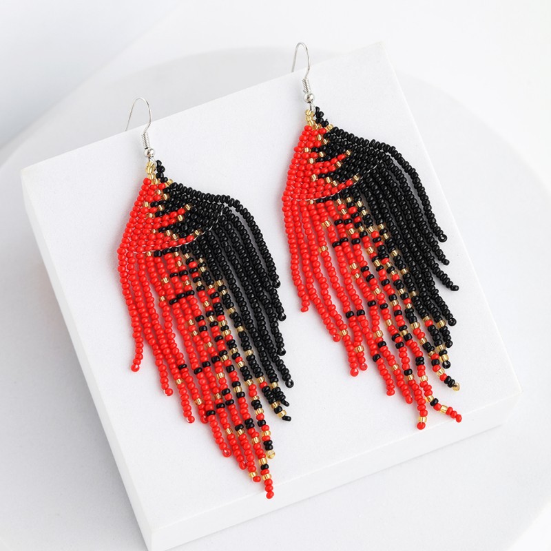 two-color woven ethnic elegant earrings handmade with tassels