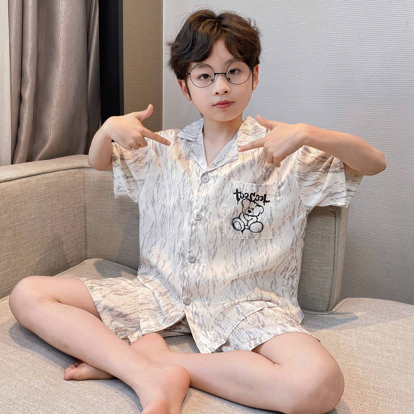 Pijamas infantiles verano 2026 nuevo niño hielo delgado de manga corta juveniles niños grandes set de ropa para el hogar