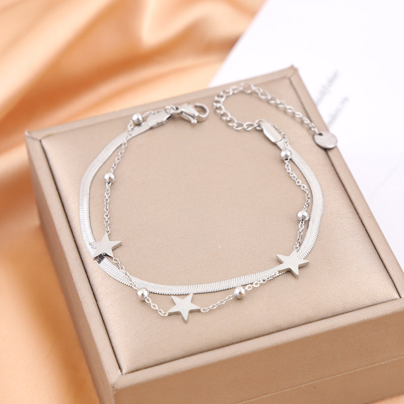 Diseño de nicho transfronterizo sensación de cadena de estrellas doble capa de acero de titanio chapado en oro moda universal no desvanecer pulseras al por mayor
