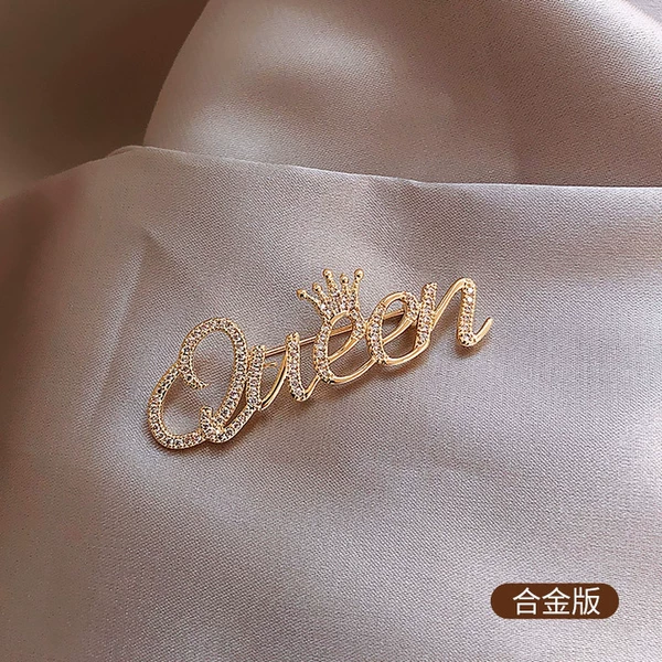 Golden brooch, English