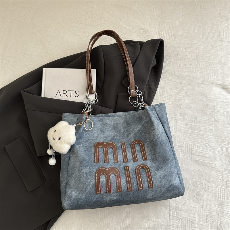 Bolso de otoño de mujer de gran capacidad de transporte 2024 nuevo bolso de hombro de moda nicho de alto nivel bolso de brazo