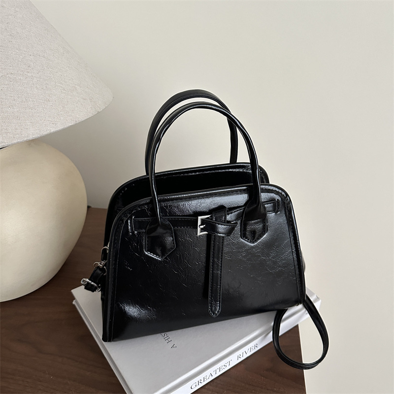 2025 primavera nuevo bolso retro lujo ligero bolso de viaje diario simple estilo extranjero bolso de hombro