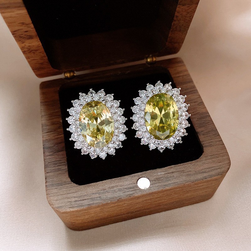 Temperamento de pendientes verdes pendientes ligeros lujosos de alto nivel sensación de pendientes zircon flores joyas geométricas al por mayor fábrica