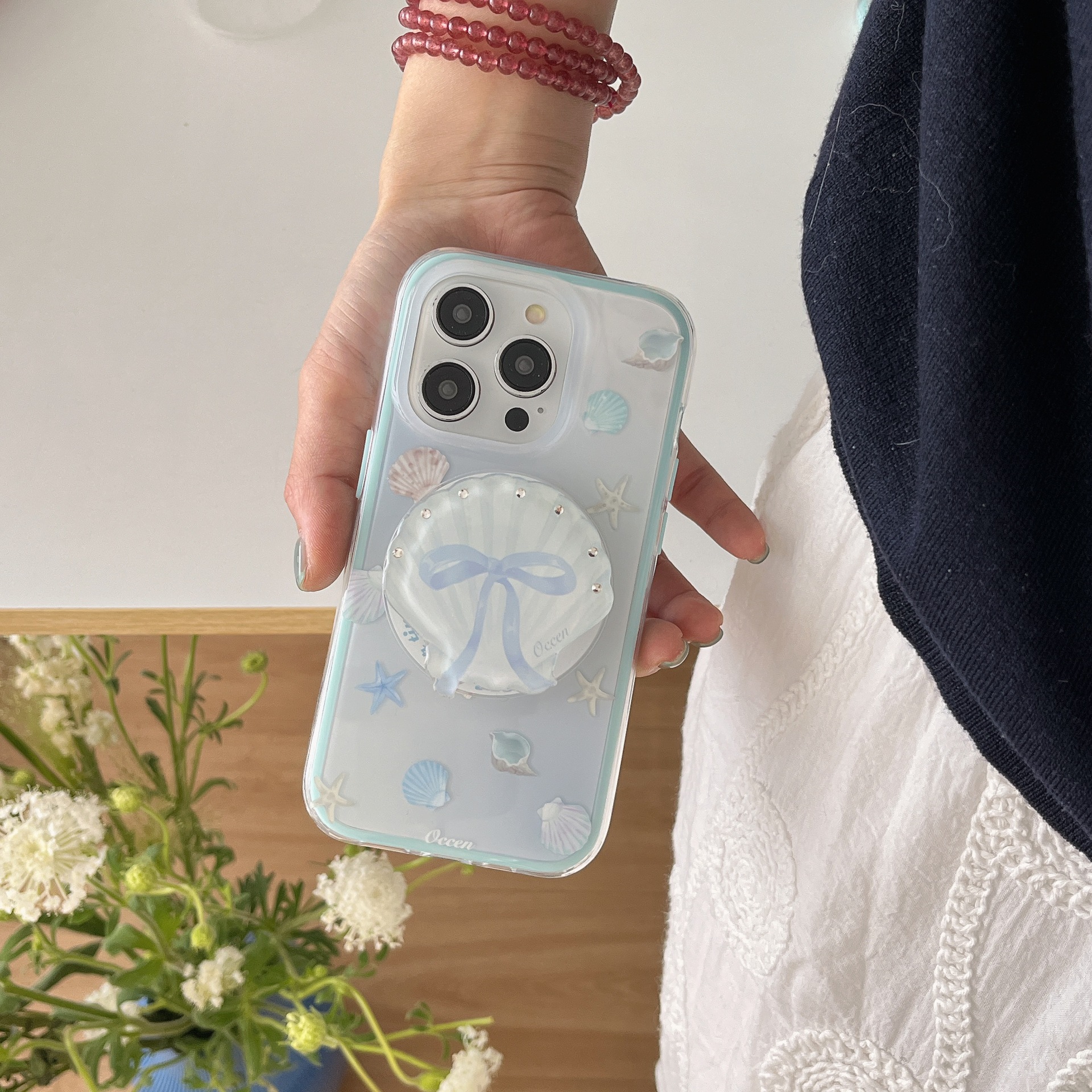 Verano pequeño fresco y simple concha para Apple 15ProMax funda para teléfono móvil 16Pro atracción magnética 14/13 pareja 16