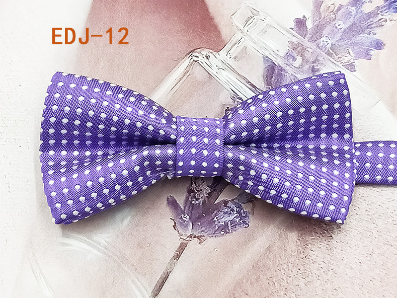 Lugar del fabricante Versión coreana de la pajarita para niños de doble capa para estudiantes de primaria hilo de poliéster teñido en hilo de seda color sólido accesorios para mascotas lazo