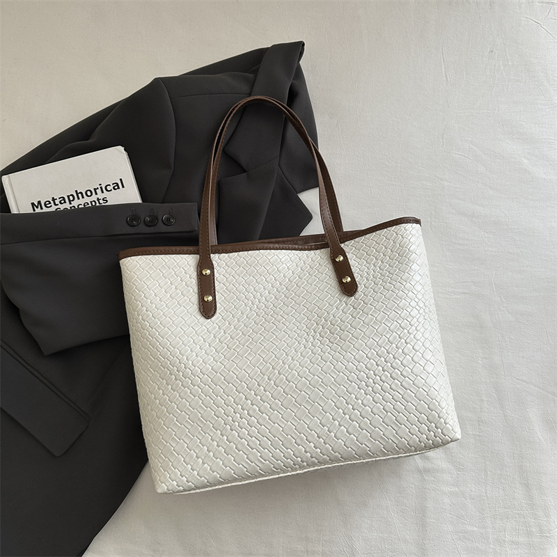2025 nuevo estilo hermoso y simple bolso portátil portátil moda retro bolso de gran capacidad personalidad femenina bolso de axila de un solo hombro