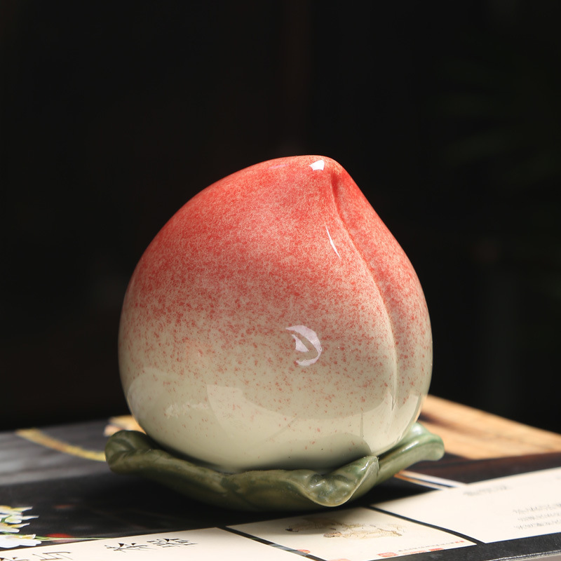 Peach-Shaped Ceramic Small Tea Canister for Home Use, Creative Sealed Storage Jar, Decorative Mini Tea Canister, Peach-Shaped Souvenir Gift