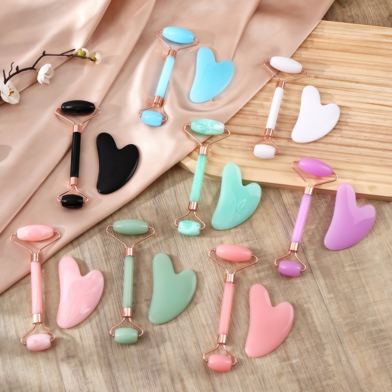 Rodillo facial de cristal en forma de corazón para masaje y lifting