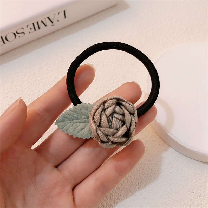 El viento francés pequeño anillo de cabello de rosa para mujeres de alto nivel de ardor de flores de borde de cabeza de correa de cabello para chicas