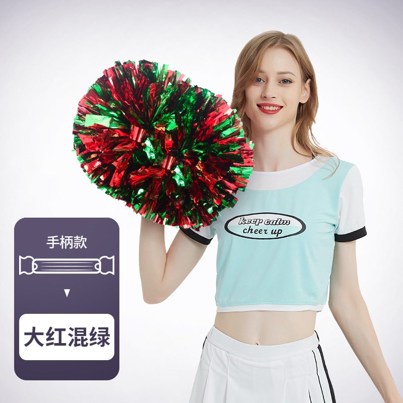 花のボールの応援団の手の花の手の手の花の運動会の手は道具の応援の道具の現物を持ちます。|undefined