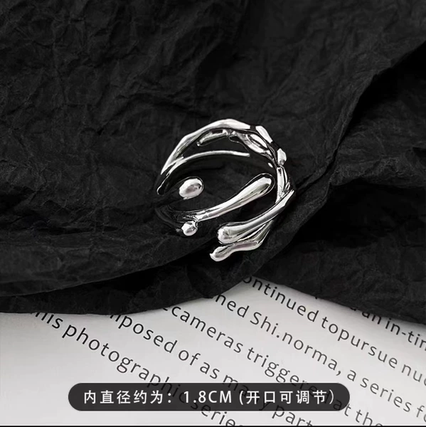 1869 Cross-opening line ring