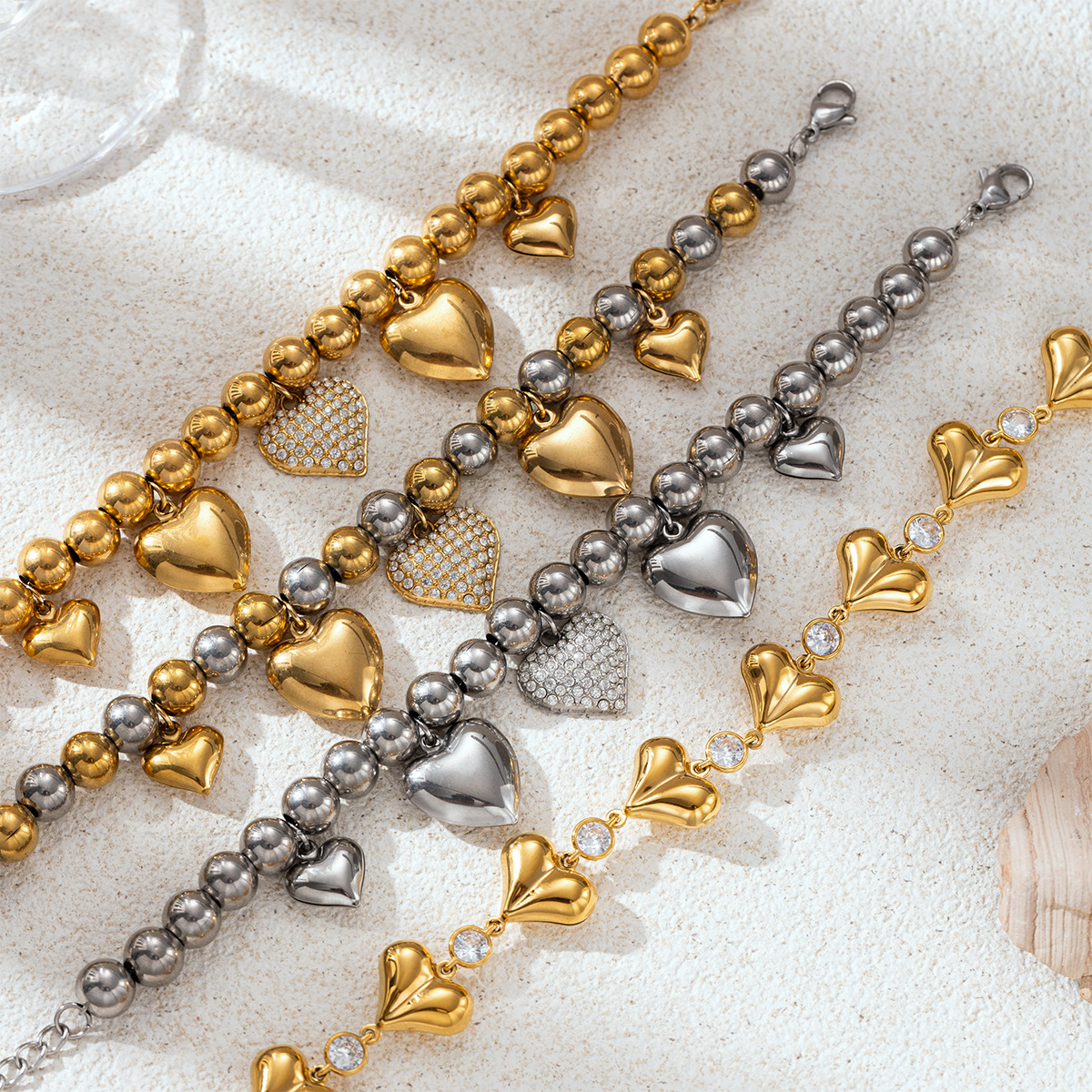 Tina Europa y América pulsera de acero inoxidable lujosa alta sensación de amor versátil más colgante diseño pulsera no se desvanece mujer