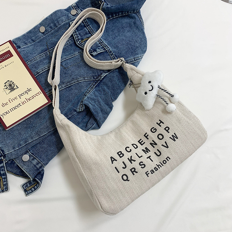 Bolso Tote de gran capacidad de moda literaria para mujer 2024 verano nuevo bolso de hombro casual simple bolso de mensajero de sentido avanzado
