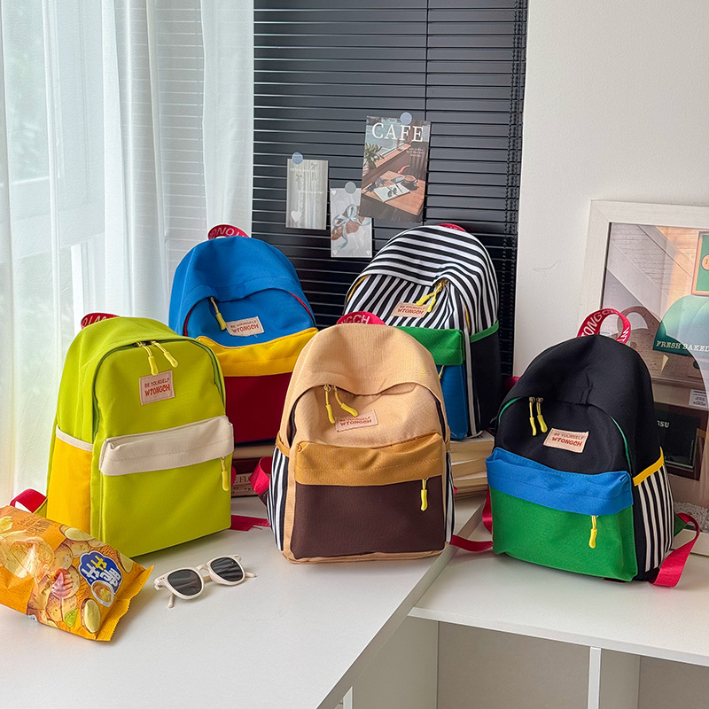 Mochila escolar de jardín de infantes para estudiantes de escuela primaria, moda a rayas, color occidental, mochila para niños y niñas, nueva mochila para niños transfronteriza