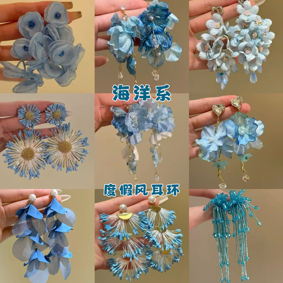 Pendientes de borla de cuentas de arroz de flor de gasa de aguja de plata Pendientes de todo fósforo de estilo de vacaciones Pendientes frescos y dulces para mujer