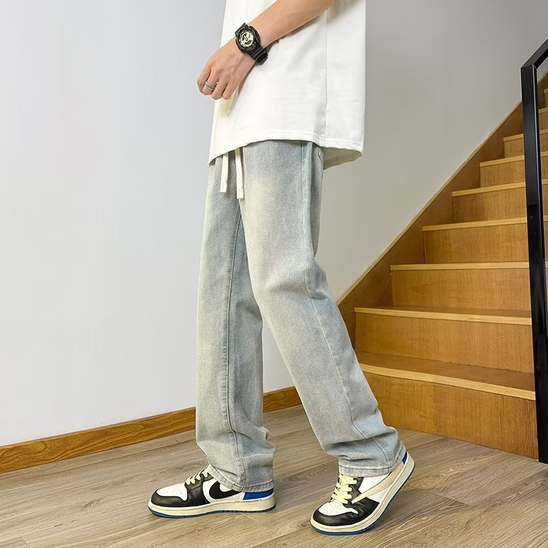 Vaqueros americanos, pantalones teñidos de barro amarillo de seda de hielo viejos lavados de verano para hombres, pantalones rectos sueltos de la marca de moda de la calle principal