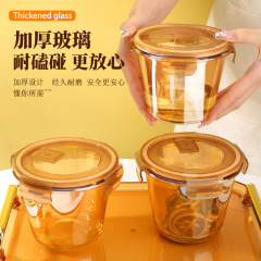 ガラスの弁当箱の丸いスープの碗は蓋を持っています。