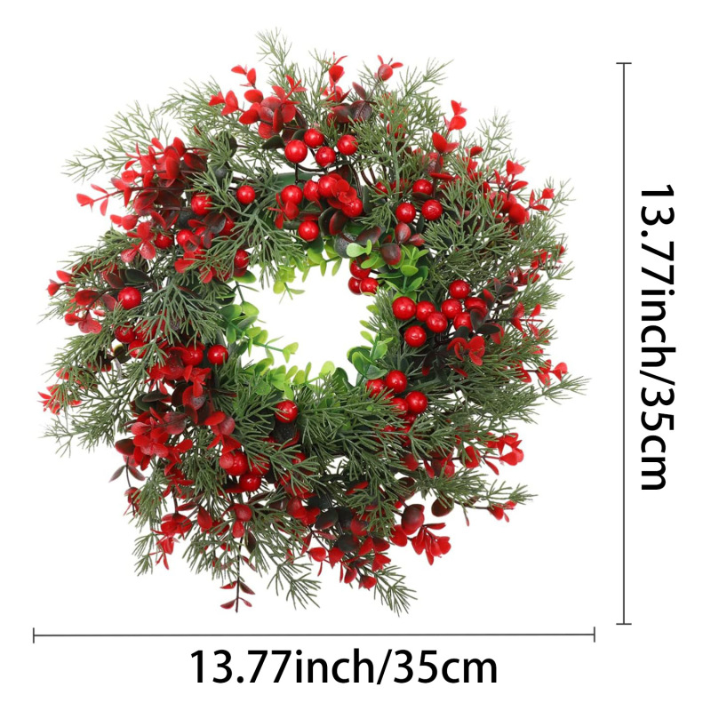 国境を越えたアメリカの赤い実クリスマス装飾花輪ユーカリ藤輪ユーカリの葉の扉にショーウインドーを掛けて冬青果を配置する|undefined