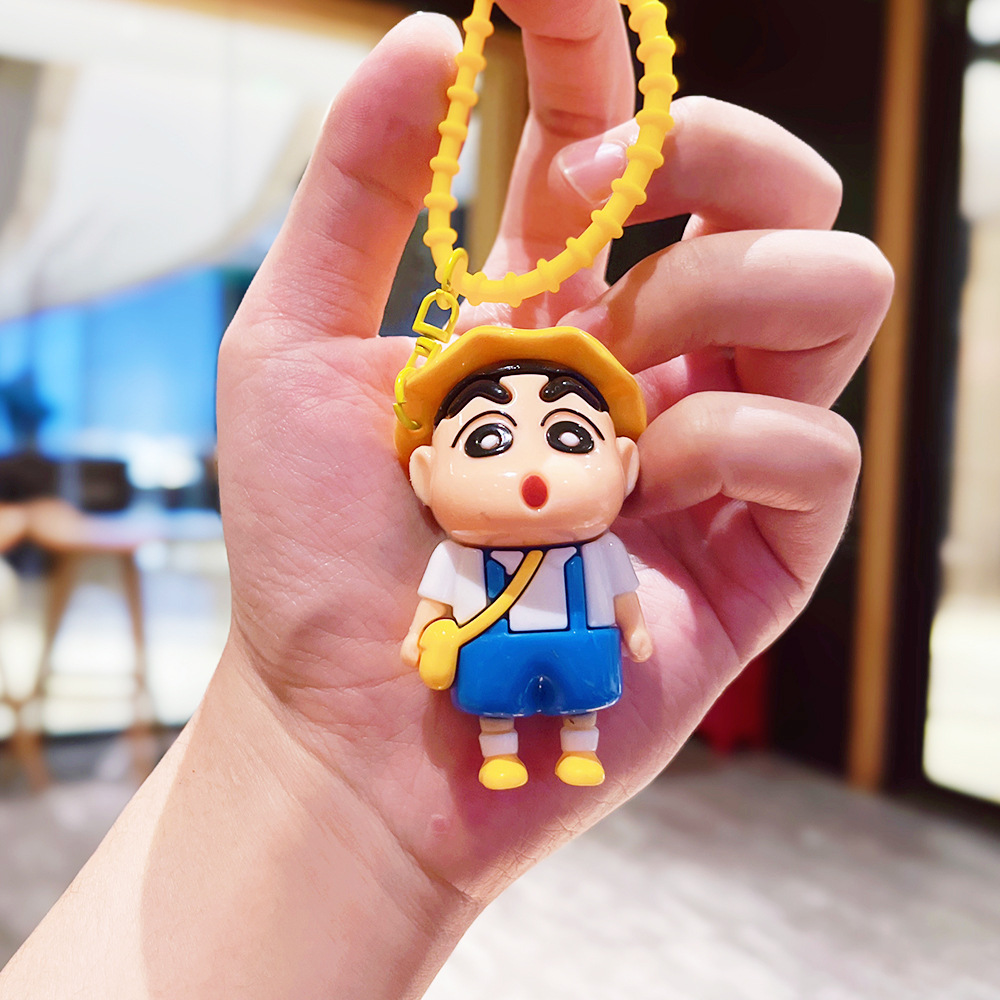 漫画のかわいいクレヨンの小さい新しい子供のキーホルダーの柔らかいゴムの人形のカバンの自動車のペンダントのカップルの小さい贈り物の卸売り