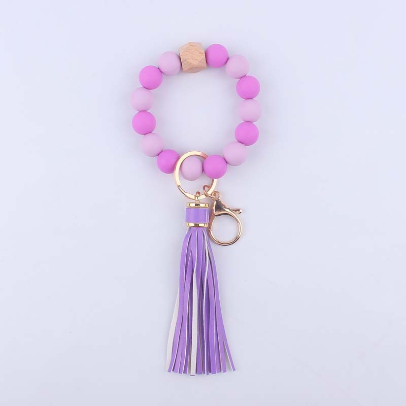 Nueva pulsera de silicona creativa muñeca llavero colgante DIY borla colgante de silicona con cuentas llavero Accesorios