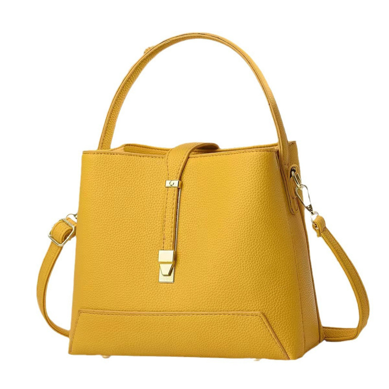 Fabricante bolsos de mujer 2025 nuevo bolsos de mano texturas coreanas de hombro de una sola forma de bolsos de cubo de mujer bolsos