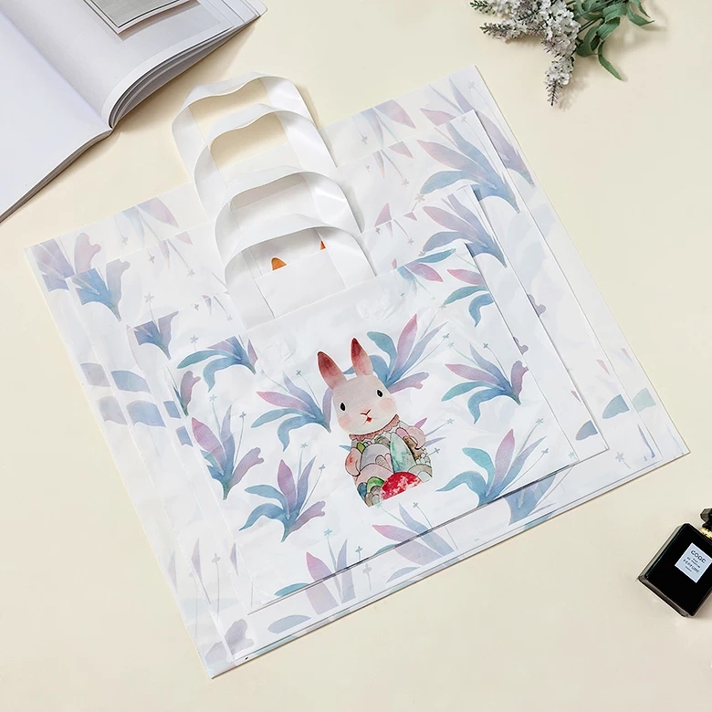 Tienda de ropa bolsa de mano flores y pájaros ropa de mujer moda regalos de plástico bolsa de compras embalaje personalizado