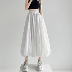百合通勤の怠惰なスポーツ風のゆったりした半身のスカートの女性の街頭の灰色の緩い腰のつぼみのスカートの中で長いスカート
