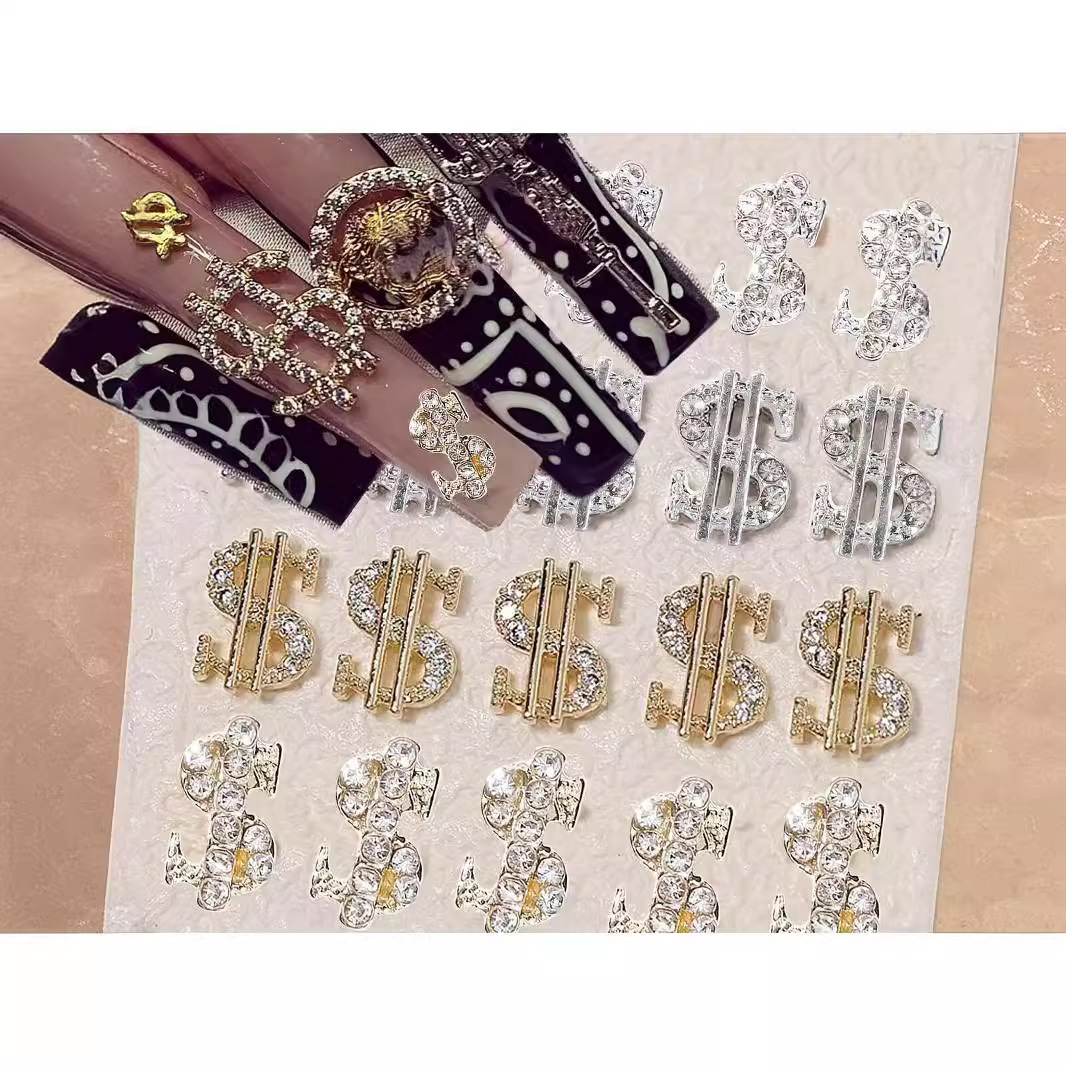 Joyería de uñas transfronteriza oro plata dólar símbolo moneda símbolo de uñas Luz de lujo flash diamante tridimensional decoración de diamantes