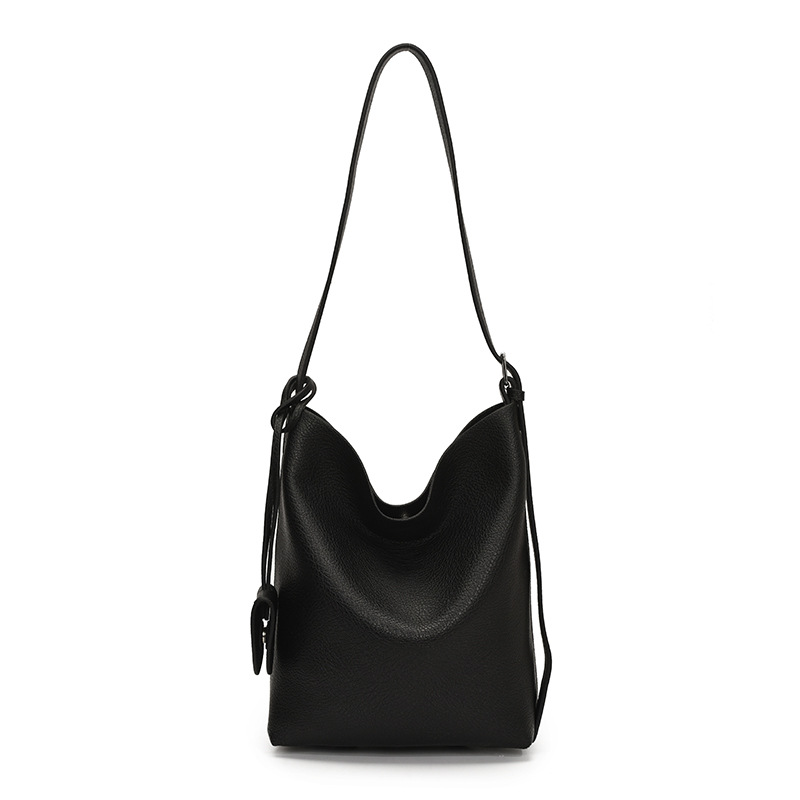 Bolso de cubo de mano de moda de comercio exterior para mujer 2025 nuevo bolso de hombro simple de venta caliente versión coreana bolso casual de alta gama
