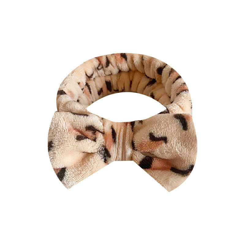 Europa y los Estados Unidos ondulado punto de leopardo coral mariposa fin correa de cabello mujer lavado cara banda de cabello rayas transfronterizas peluche adornamientos para el cabello al por mayor