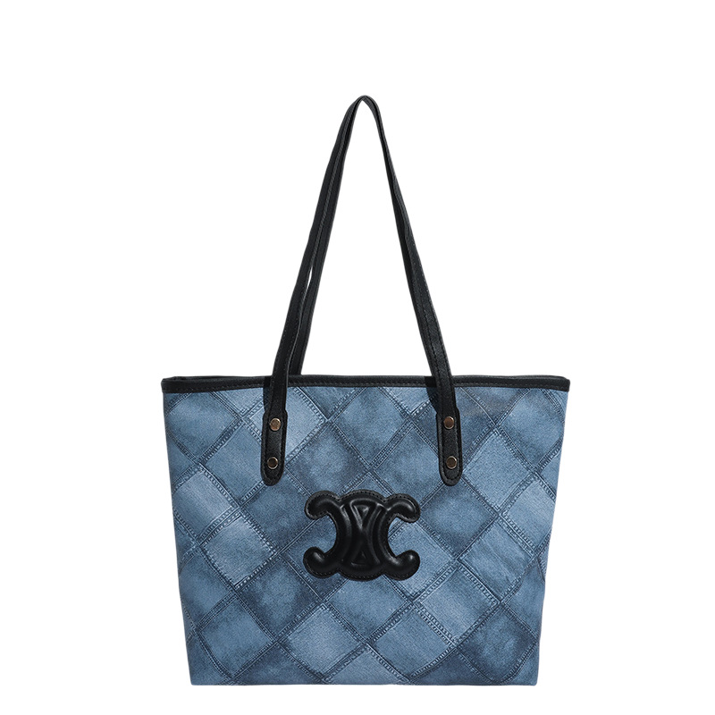 Bolsa de mano transfronteriza de gran capacidad para mujeres 2025, nueva sensación de alta calidad, bolso de hombro de viaje universal, bolso de moda