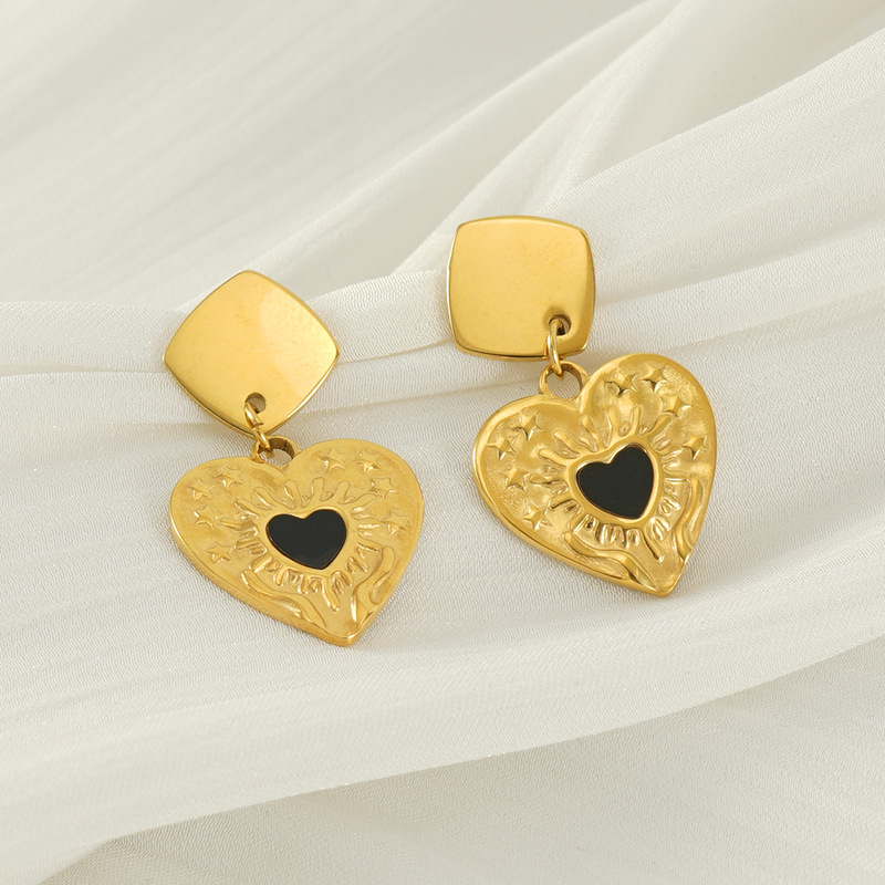 Pendientes de amor de aceite de goteo de lujo ligero de nuevo estilo, personalidad de moda femenina, colgante de corazón de melocotón, pendientes chapados en oro de 18 quilates, fabricante de sensación de alta gama