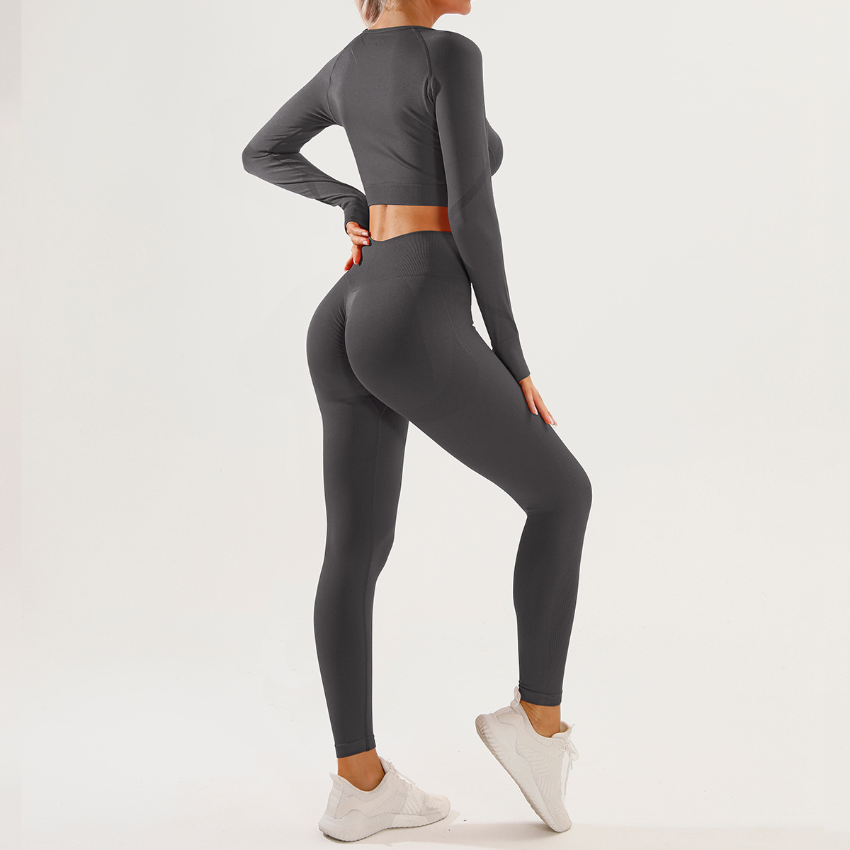 Traje de ropa de yoga sonriente sin costuras europeo y americano, pantalones de manga larga para mujer, traje de dos piezas, traje de pantalones de fitness de cadera de miel sonriente delgado