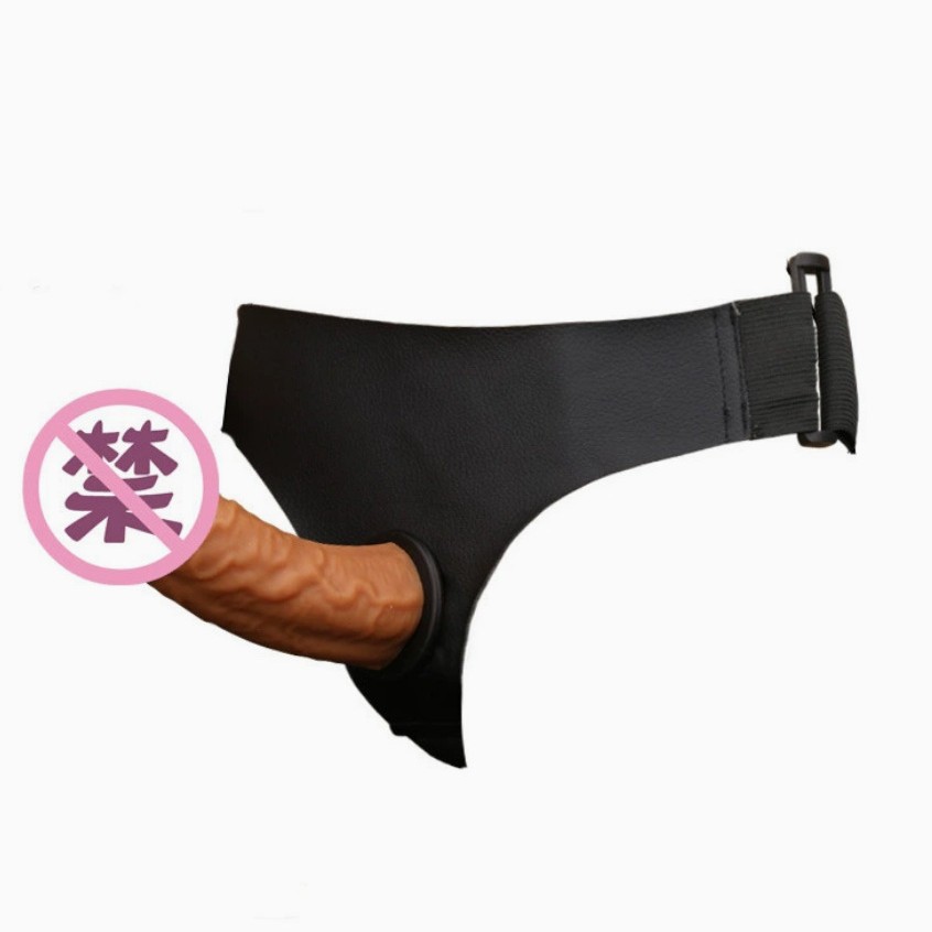 Yunman usa pantalones de cuero, penis de raíz masculino, penis falso para hombres y mujeres, artículos de sexo lesbiano para adultos.