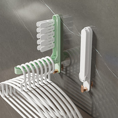 New-style clothes hanger storage gadget: No-drill home balcony wall-mounted drying rack with small-item hooks and a handy storage shelf