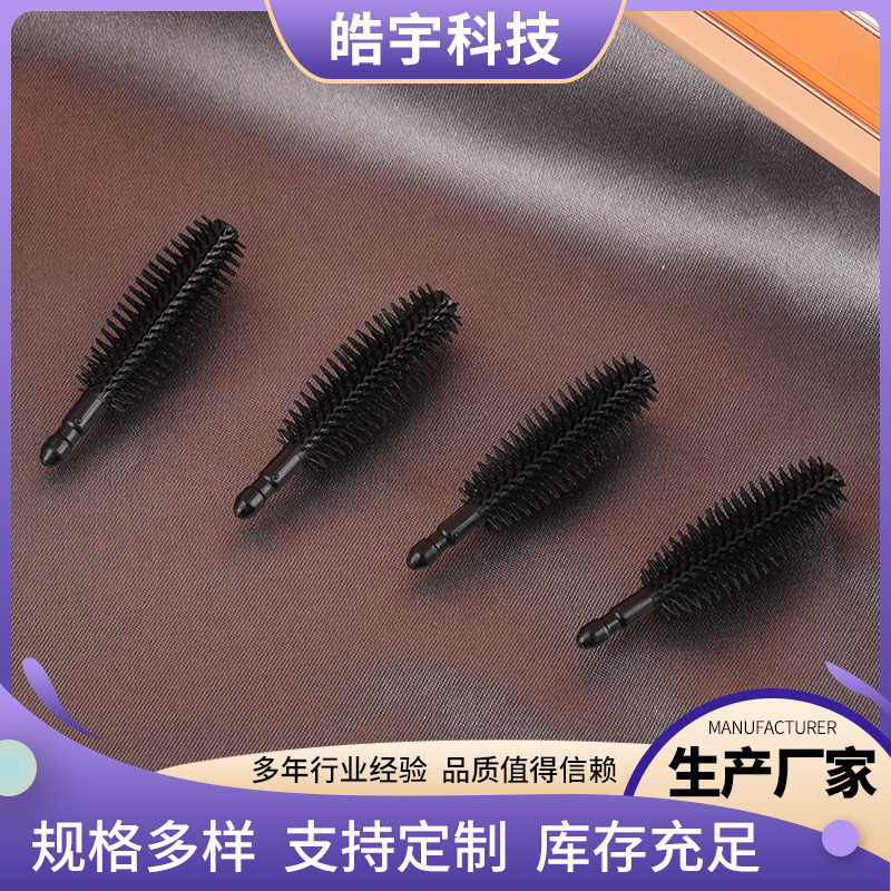 The manufacturer supplies disposable olive-shaped eyelash brush…