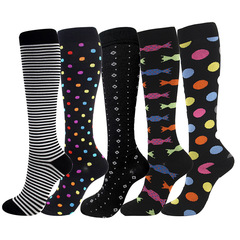 Leg pressure socks set, including calf socks with polka dot and striped compression socks.