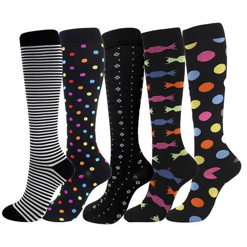 Leg pressure socks set, including calf socks with polka dot and striped compression socks.