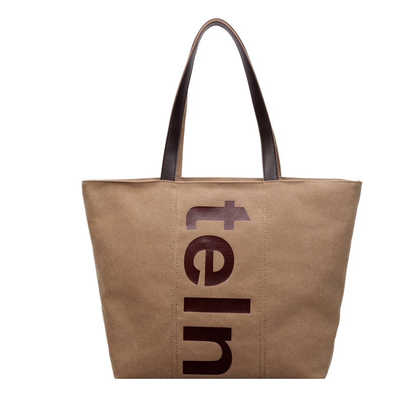 2026 nueva bolsa de hombro coreana versátil bolsa de lona casual para estudiantes universitarios de clase simple bolsa de viaje diario