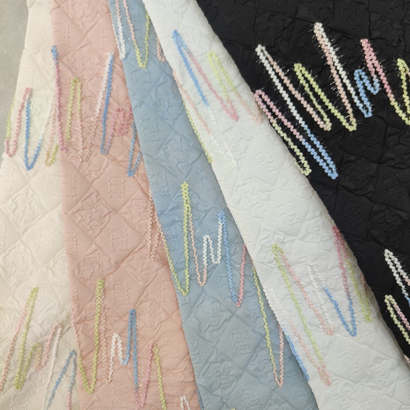 新品尼丝纺压绉千彩刺绣面料涤纶压皱春夏衬衫连衣裙箱包鞋帽布料