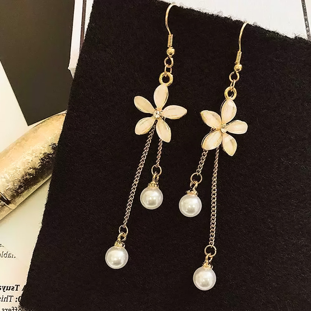 Pendientes largos con flecos elegantes y diamantes con aguja de plata Pendientes de todo fósforo de temperamento de nicho Pendientes simples y ligeros de lujo de alta gama Mujeres