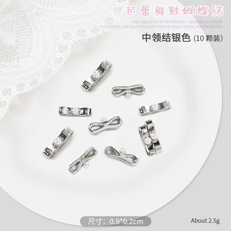 Pequeño libro rojo explosión zapatos de ballet arco flotante joyería de manicura corbata tridimensional 10 paquetes de aleación