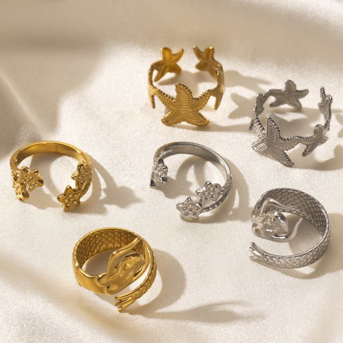 Anillo de acero de titanio al por mayor transfronterizo de Tena, lujo ligero, estrella de mar de nicho, sirena, soporte de acero inoxidable, joyería de mano de estilo europeo y americano
