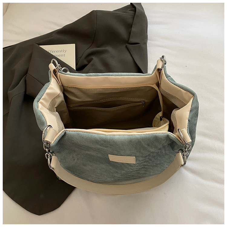 Korean style simple and versatile bag for women, new summer 2025 fashion and niche handbag, large capacity tote bag for commuting undefined