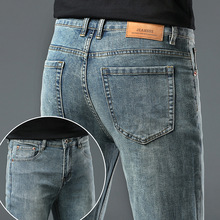 香港高端潮牌牛仔裤男修身小脚百搭休闲复古做旧长裤子秋冬厚款