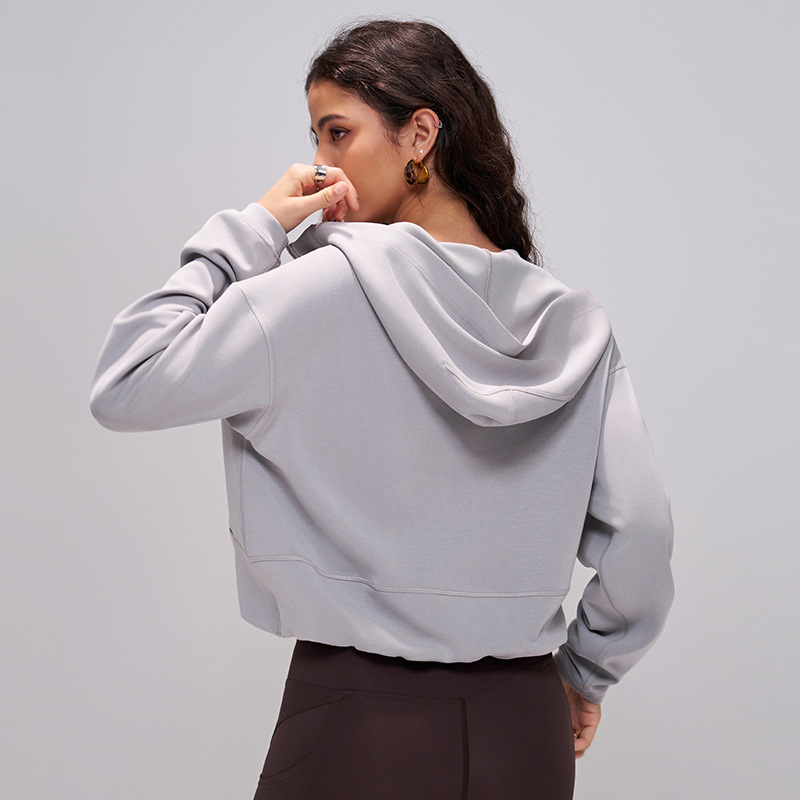 Primavera y otoño de mangas largas camisetas deportivas encapuchadas mujeres cintura doblada chaqueta de fitness para correr al aire libre chaqueta casual