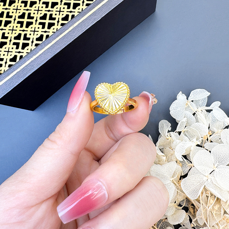 Nuevo collar de oro de arena de Vietnam lujoso ligero corazón de viento joyería de patrón horizontal combinación de pernos de orejas de mujer fábrica directa suministro al por mayor