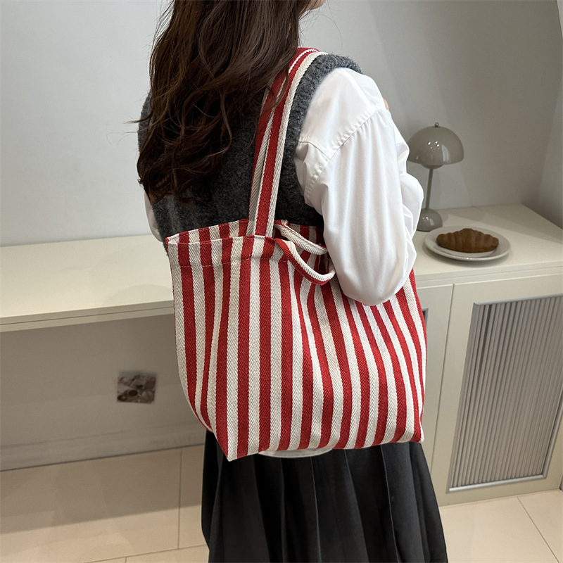 2024 estilo estilo estilo estilo coreano retro bolso de mano simple pequeño fresco de moda gran capacidad bolso de hombro a rayas